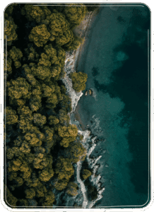 Aerial view of peaceful coastline representing calm after trauma healing in Washington